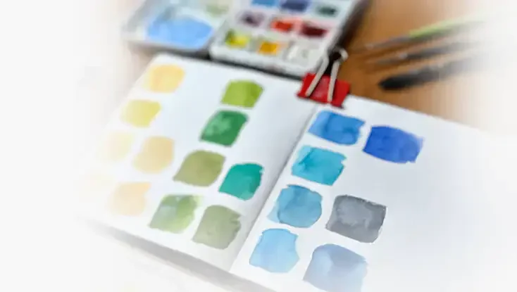 Paleta de aquarela e pincéis